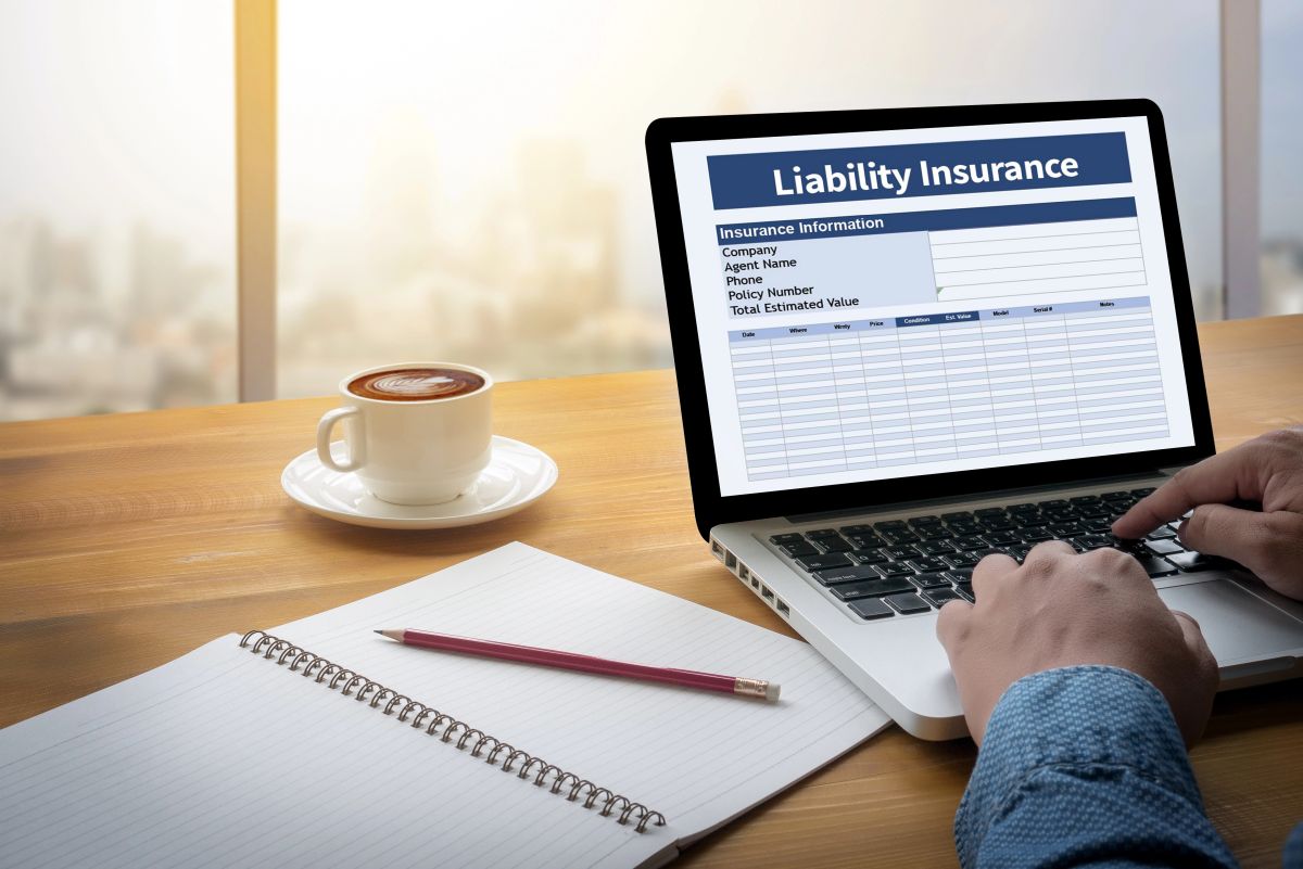 Computer with liability insurance form in Salem, MA