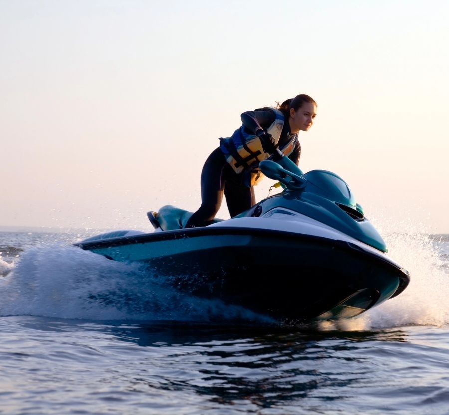 Woman with Jet Ski Insurance enjoying a ride on the water in Lynn, MA